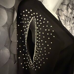 Elegant Black Cold Shoulder Long Sleeve Top with Silver Accents